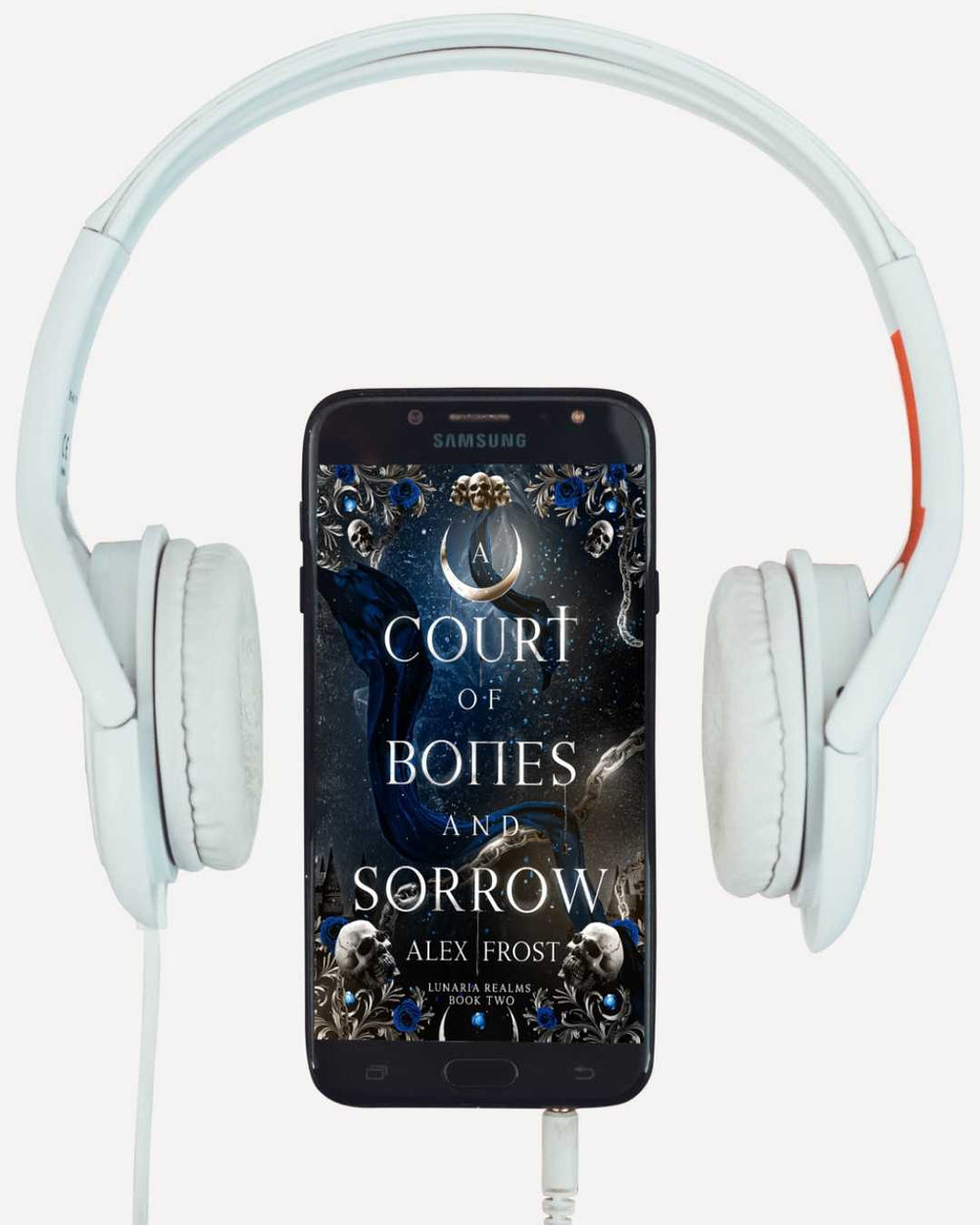 Phone with 'A Court of Bones and Sorrow' book cover displayed, flanked by white headphones.