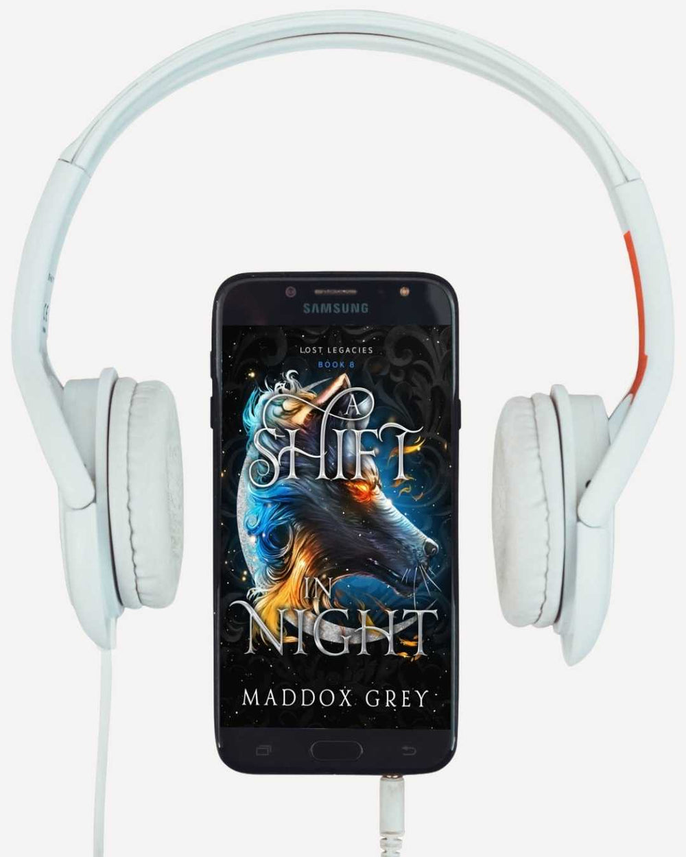 Phone with 'The Shift in Night' book cover displayed, flanked by white headphones on a white background