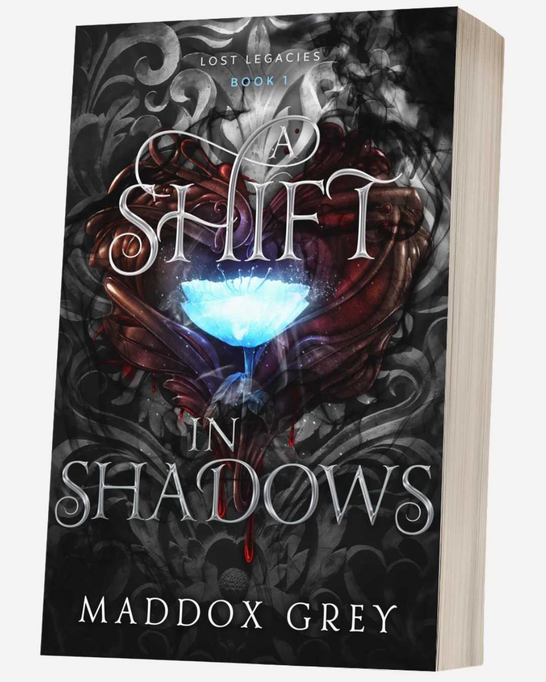 Book titled 'A Shift in Shadows' by Maddox Grey on a dark background