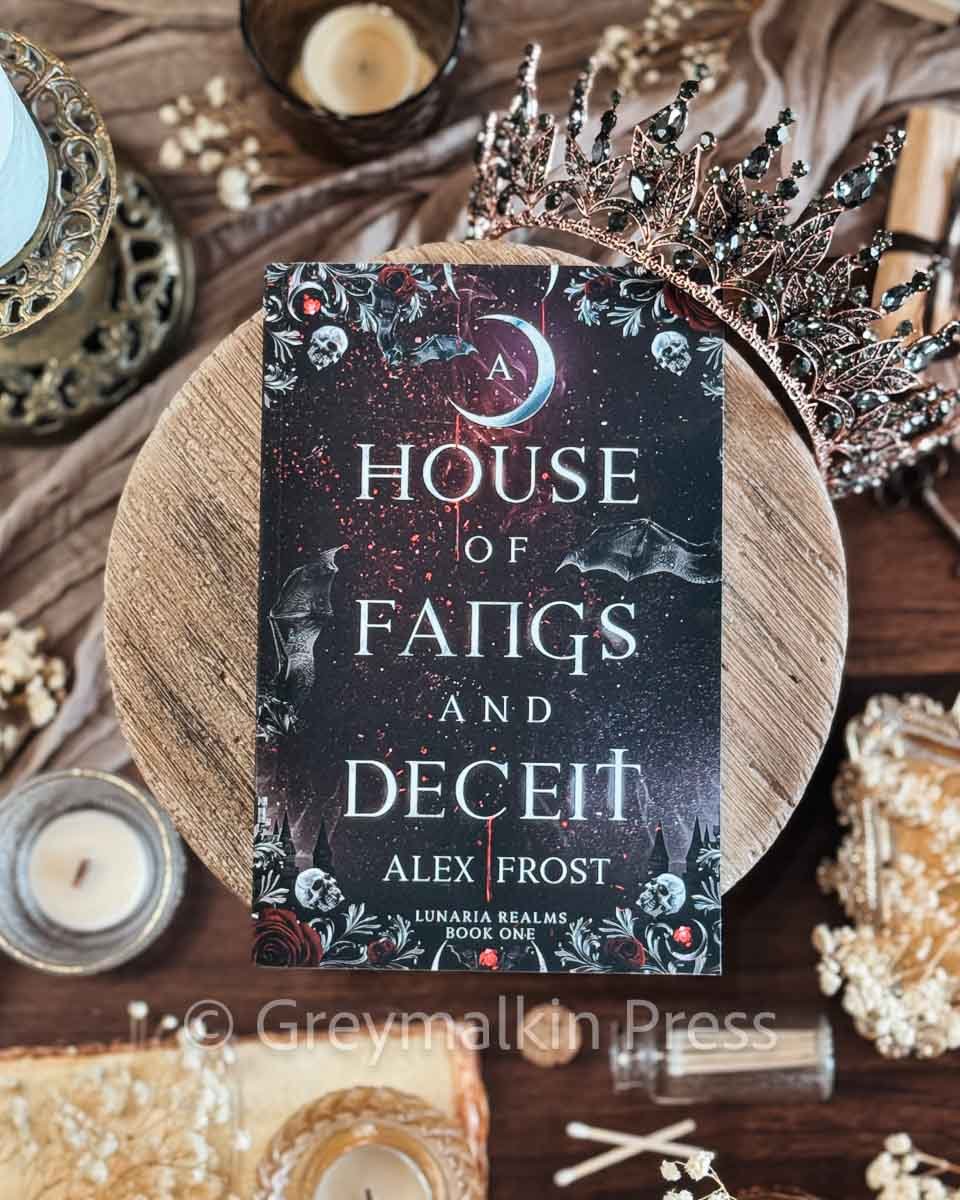 A House of Fangs & Deceit [PAPERBACK] - Greymalkin Press